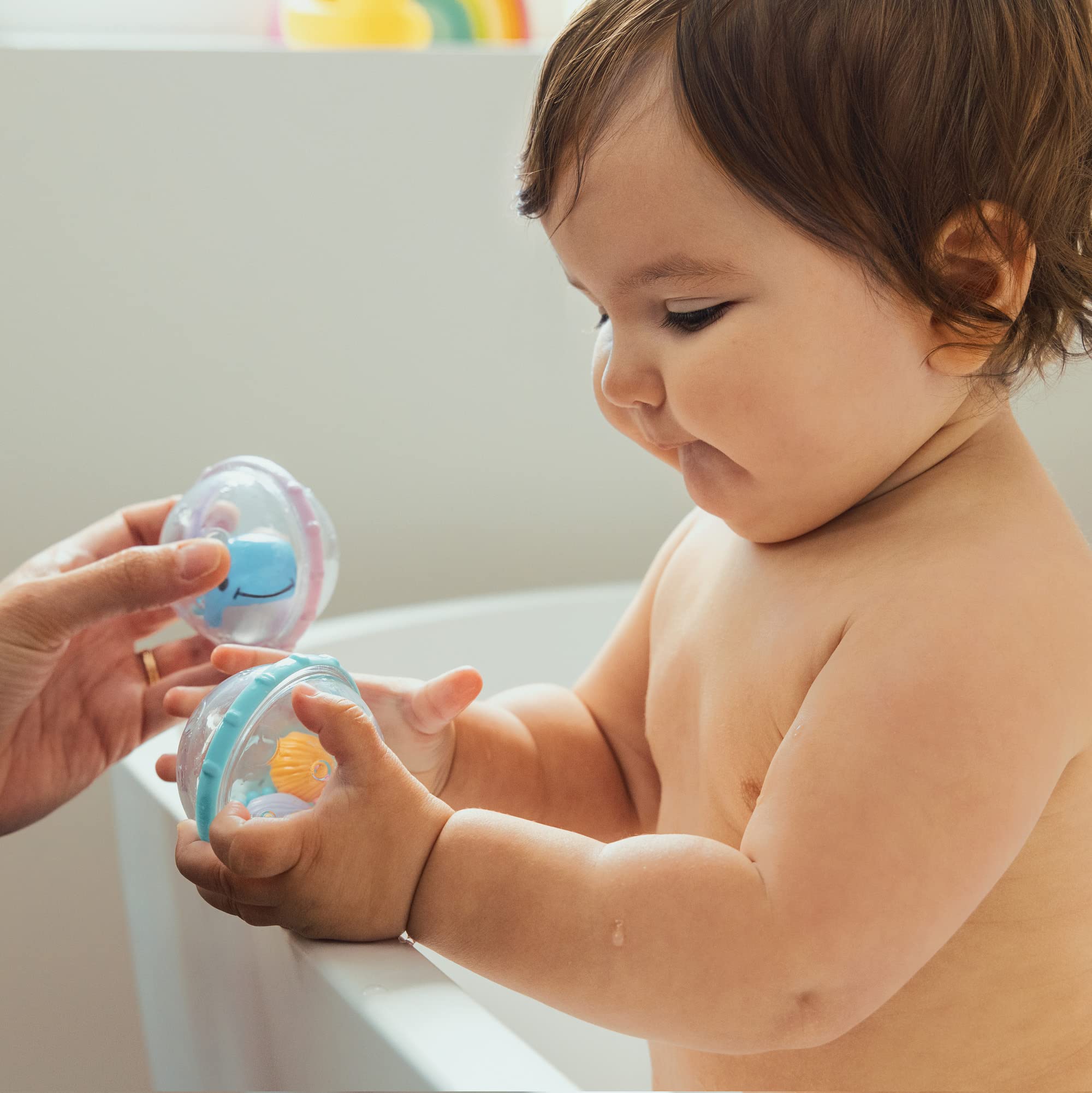 munchkin-float-and-play-bubbles-lot-de-2-jouets-de-bain-flottants-sensoriels-pou image 7